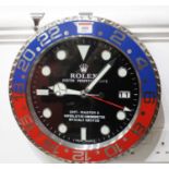 A Rolex style Pepsi dial wall clock, with quartz movement, dia.34cm