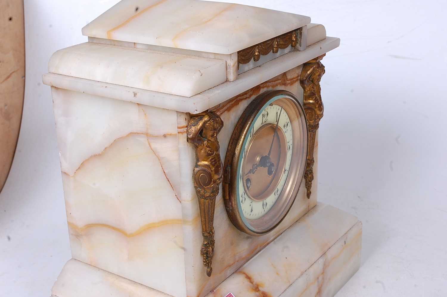 A late Victorian alabaster cased mantel clock, of architectural form with Egyptian revival type gilt - Image 3 of 3