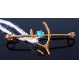 A 9ct gold and turquoise set wishbone safety pin bar brooch, 1.3g, 3.5cm, and in fitted Goldsmiths