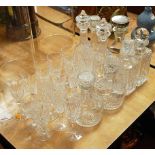 A collection of miscellaneous cut glassware, to include Waterford flutes, decanters and stoppers