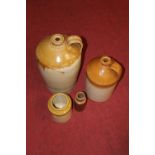 A Doulton & Co of Lambeth Pottery London salt-glazed stoneware storage flagon; together with one