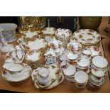 An extensive Royal Albert 12 place setting tea and dinner service in the Old Country Roses pattern