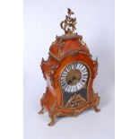 A French Rococo style kingwood and gilt metal mounted bracket clock, the gilt circular dial with