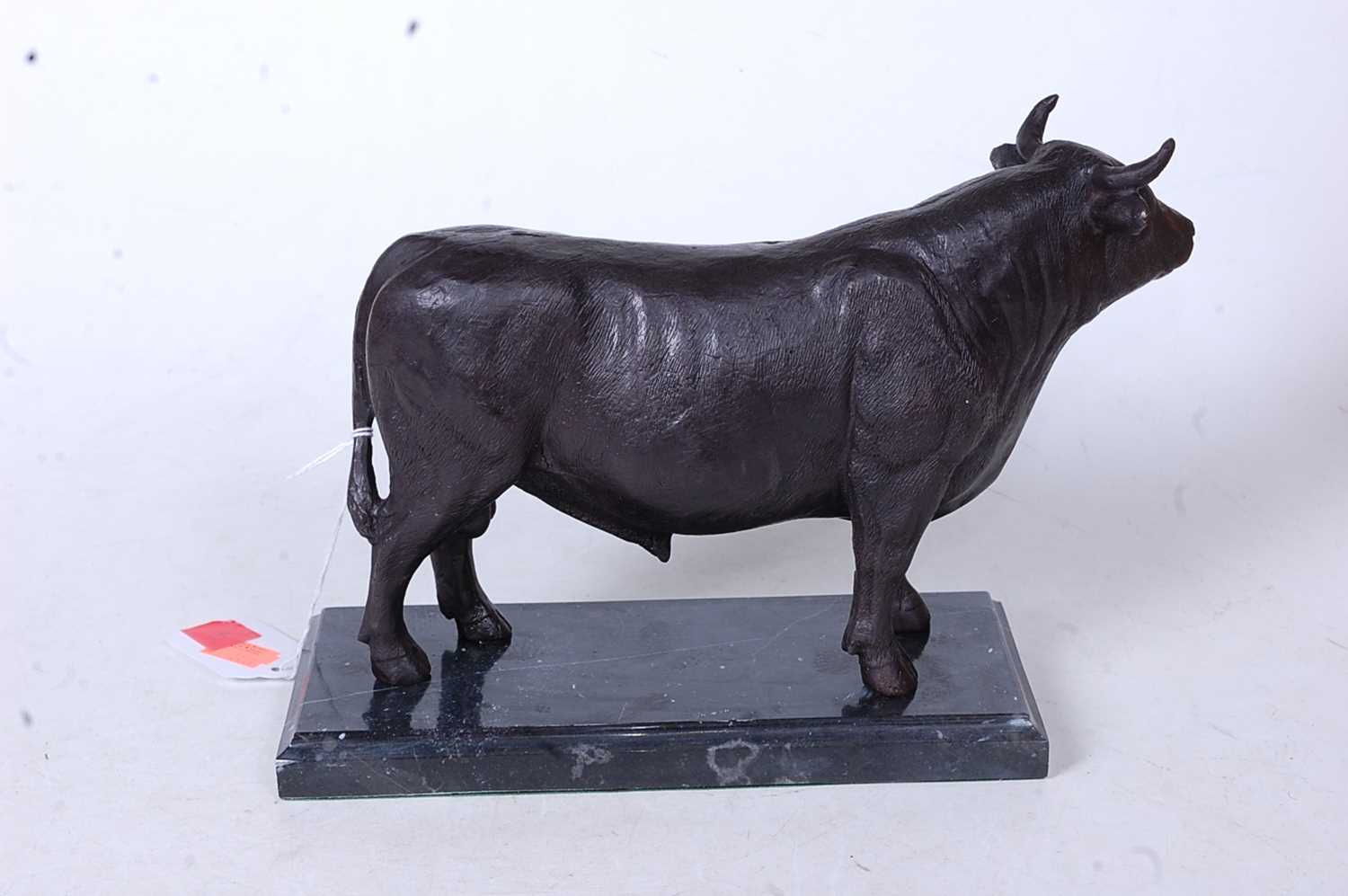 A bronze model of a bull in standing pose on marble plinth, height 19cm - Image 3 of 3