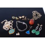Assorted costume jewellery to include ear clips, ear studs, gilt metal and enamel locket, jadeite
