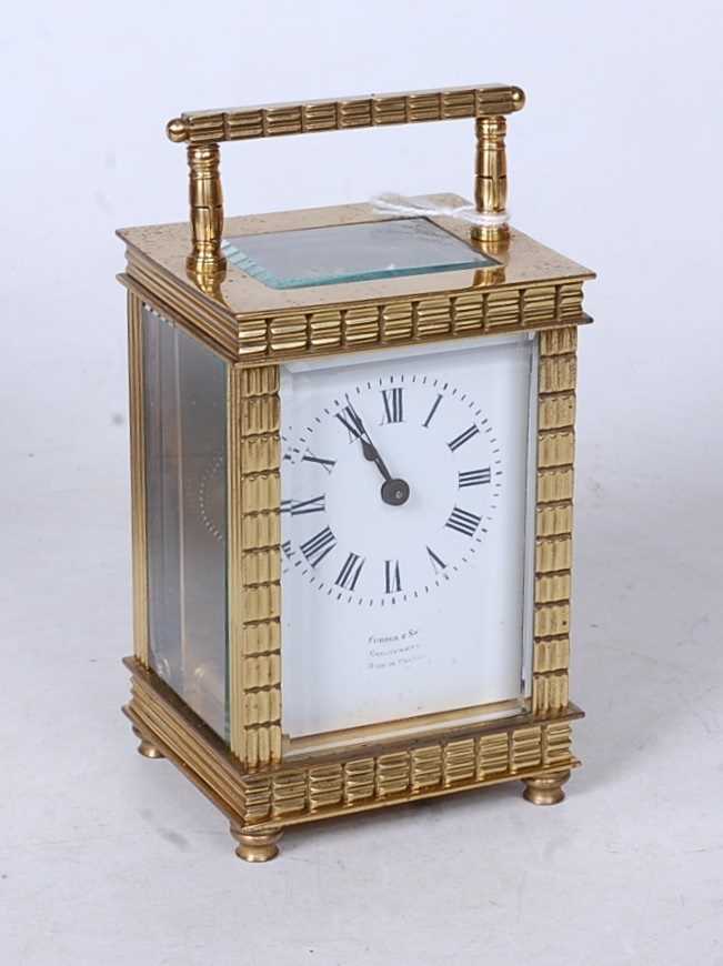 An early 20th century French lacquered brass cased carriage clock, with single train movement and