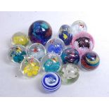 A collection of assorted modern glass paperweights, to include Caithness Obsession numbered 222137