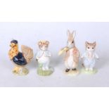 A collection of four John Beswick Beatrix Potter figures, to include Sowy Henny Penny, Tom Kitten,