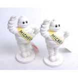 A pair of painted cast metal Michelin advertising figures, height 17cm