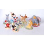 A collection of eight Royal Doulton Film Classic Collection Walt Disney Showcase porcelain