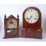 A Victorian walnut cased dome top mantel clock having a circular enamel dial with Roman numerals