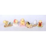 A collection of six Royal Doulton Winnie the Pooh Collection porcelain figures, to include Piglet