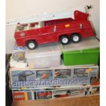 Two boxes of vintage Lego pieces, computer battle ship box game, Tonka Toys fire engine, further