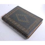 A Victorian green Moroccan leather and gilt tooled photograph album, lacking contents