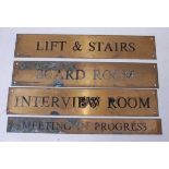 Four brass name plates, with various annotations to include Meeting in Progress, Interview Room,