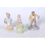 A collection of three John Beswick Beatrix Potter figures, to include Farmer Potatoes, Peter in