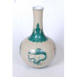 A Chinese porcelain bottle vase, having a slender neck to a bulbous lower body, enamel decorated