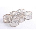 A set of six modern silver napkin rings, of pierced circular form, gross weight 2.3oz