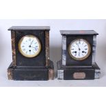 A late Victorian black slate and grey marble mantel clock having an enamel dial with Roman