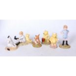 A collection of six Royal Doulton Winnie the Pooh collection porcelain figures, to include Eeyore'