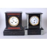 A late Victorian black slate and grey marble mantel clock having an enamel dial with Roman