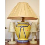A pair of onyx table lamps, each having a trumpet shaped shade, h.27cm; together with a large yellow