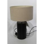 A pair of contemporary turned and stitched tan leather table lamps, with suede shades, h.49cm