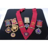 Assorted Masonic jewels to include silver gilt shield shape example, one other silver and enamel