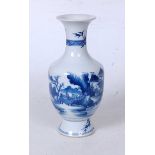 A Chinese export blue and white vase, having a flared rim to a slender neck and bulbous lower