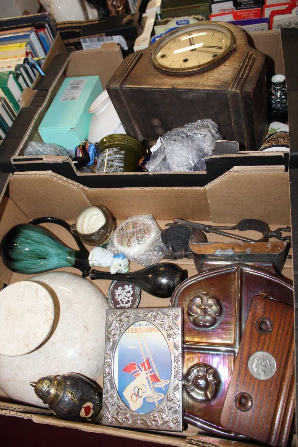 Two boxes of mixed effects to include; a 1930s oak mantel clock, polished marble fruit bowl,