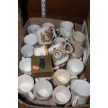 A collection of Royal commemorative mugs to include Elizabeth II Coronation, Elizabeth II Silver