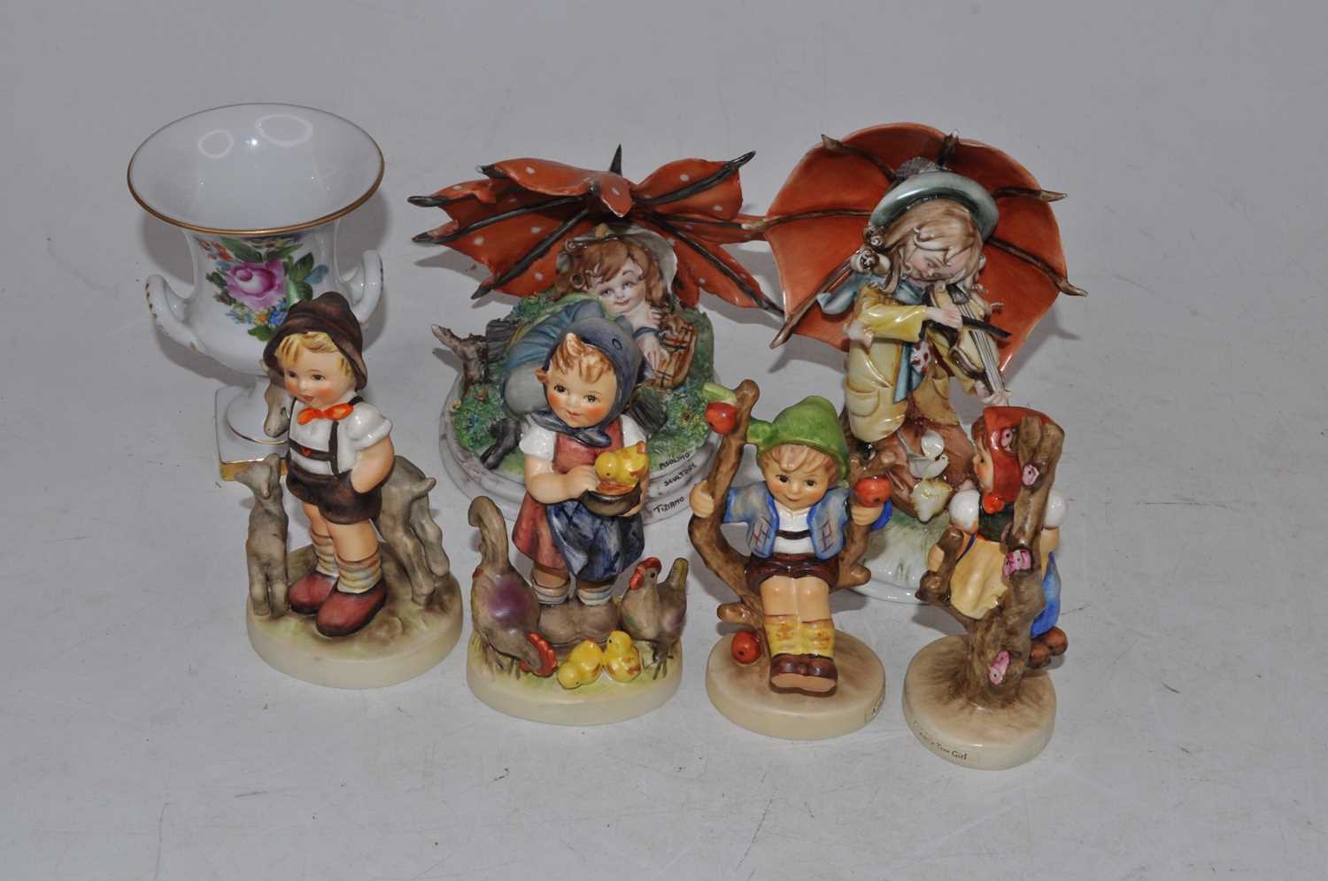 A collection of four Hummel figures, to include Appletree Boy, Feeding Time, Appletree Girl, and - Image 2 of 4