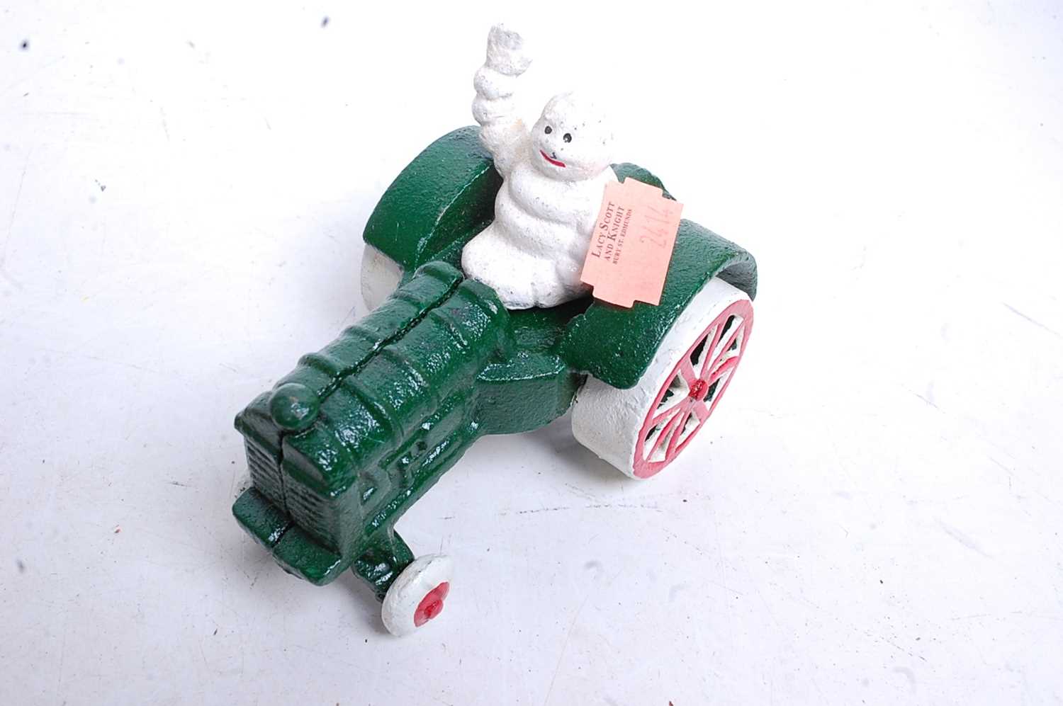 Two painted cast metal Michelin Man figures, one in a tractor, the other in an aeroplane - Image 3 of 3