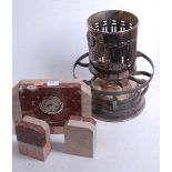 An Art Deco two colour marble three piece clock garniture together with a silver plated spirit