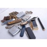 A collection of miscellaneous items, to include various pocket cigarette lighters, pocket knives,