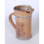 A 20th century Atkins studio pottery jug, h.16cm