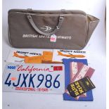 A British United Airways travel bag containing various travel documents, faux Californian number