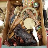 A box of miscellaneous items, to include various wooden utensils, resin figures of sages etc