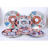 A Japanese Imari plate, of lobed circular form, dia.18.5cm; together with five other Japanese plates