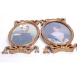 A pair of reproduction portrait prints of a military officer and a lady, within gilt frames