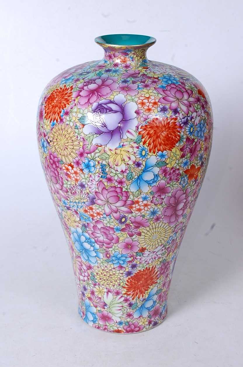A Chinese export Meiping vase, having all-over foliate enamel decoration in shades of red, pink