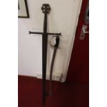 A Spanish long sword, having a 97cm double-edged blade, marked Toledo to the ricasso, the crossguard