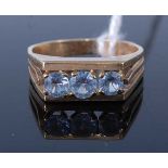 A modern 9ct gold and blue topaz set dress ring, 4.8g, size P