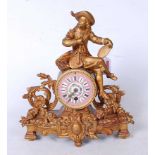 A late 19th century French gilt metal mantel clock, the central pink circular enamel dial with