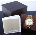 A Michael Kors gents gold plated chronograph with quartz movement, case diameter 33mm, in original