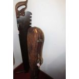 A woodcutter's twin handled saw; together with a leather violin case only (2)