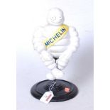 A reproduction cast metal Michelin Man advertising figure, h.30cm