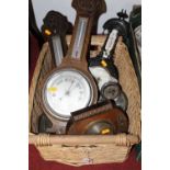 An oak two dial wheel barometer, mid-20th century; together with various other barometers and