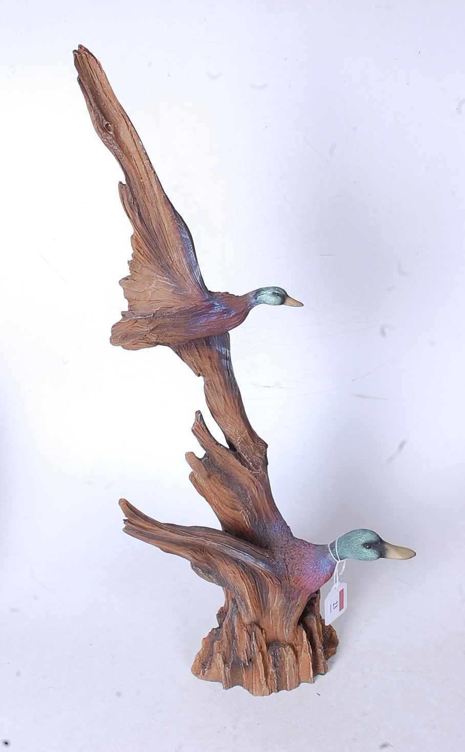 A J.H. Boone Native American sculpture of ducks, numbered 246/1000, bearing label verso 'A Walk in