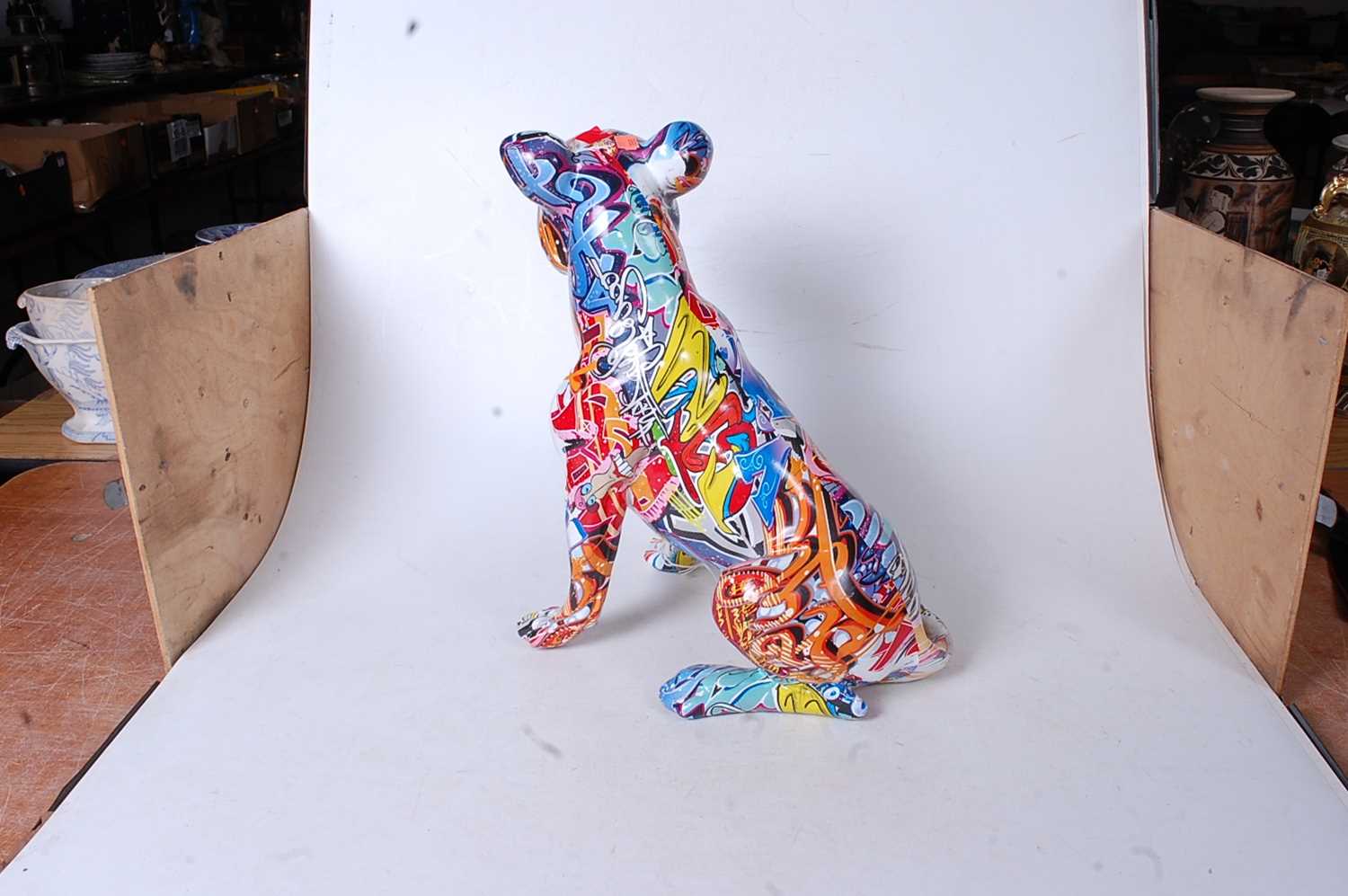 A modern model of a seated dog, with all-over decoupage type decoration, h.36cm - Image 2 of 3